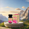 A bottle and box of Artavon Tablets are displayed on a stone pedestal against a scenic mountain background with flowers and a blue sky.