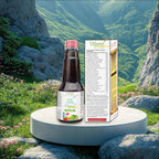Vitarist bottle and box on a rock with a mountainous landscape in the background